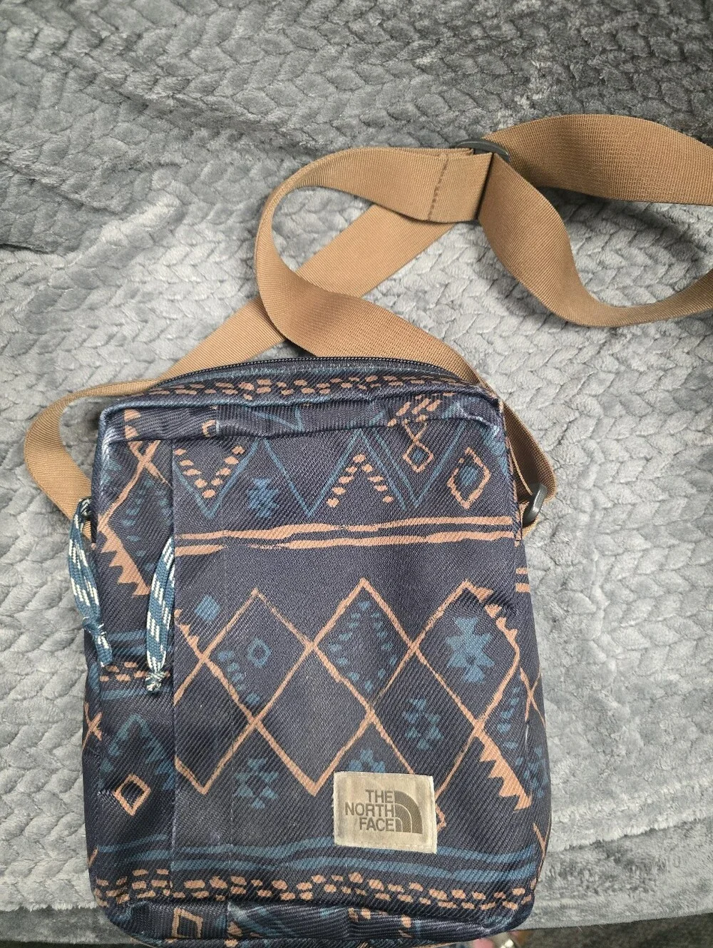 The North Face Navy Patterned Crossbody with Tan Strap